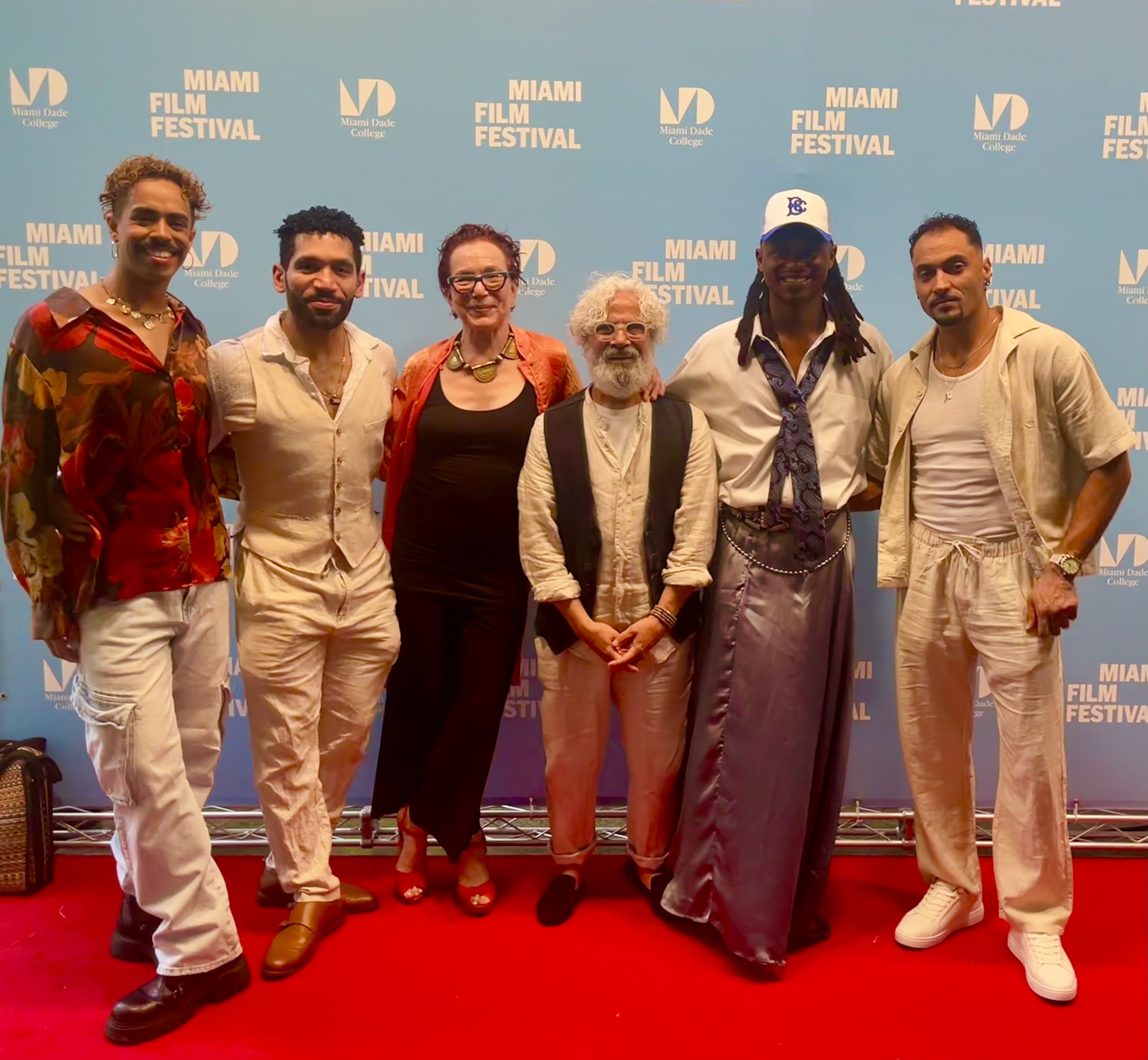 Surrounded by the dancers featured in WHEN MEN DANCE - Nataneal Leal, Antonio Velazquez, Clinton Harris, Kaique Barbosa